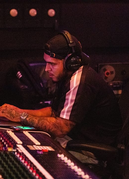 Vybe Hitz at the mixing board